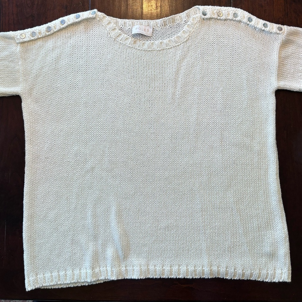 Poles by Madison Montagut white short sleeve sweater with button trim